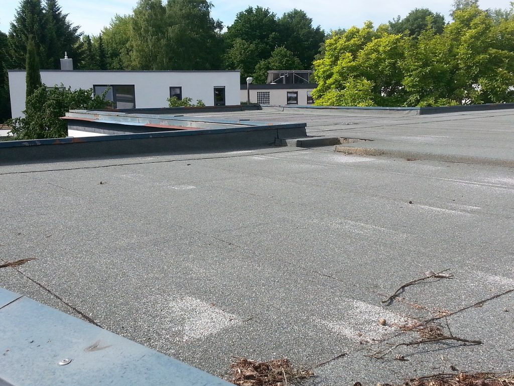 flat roofs pros and cons - roof master
